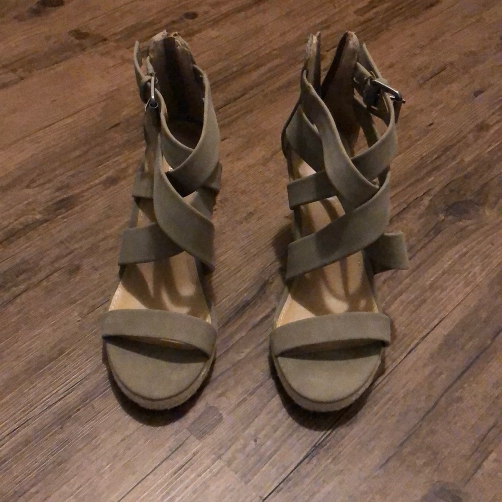 Zip up the back khaki wedge sandals.